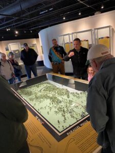 Archaeologist Bill Kennedy gives a tour in the Fort Ancient museum.