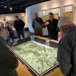 Archaeologist Bill Kennedy gives a tour in the Fort Ancient museum.